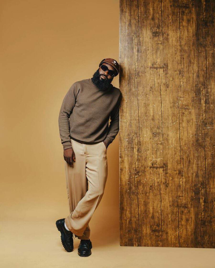 Color-balanced outfit with rich neutrals and one intentional accent